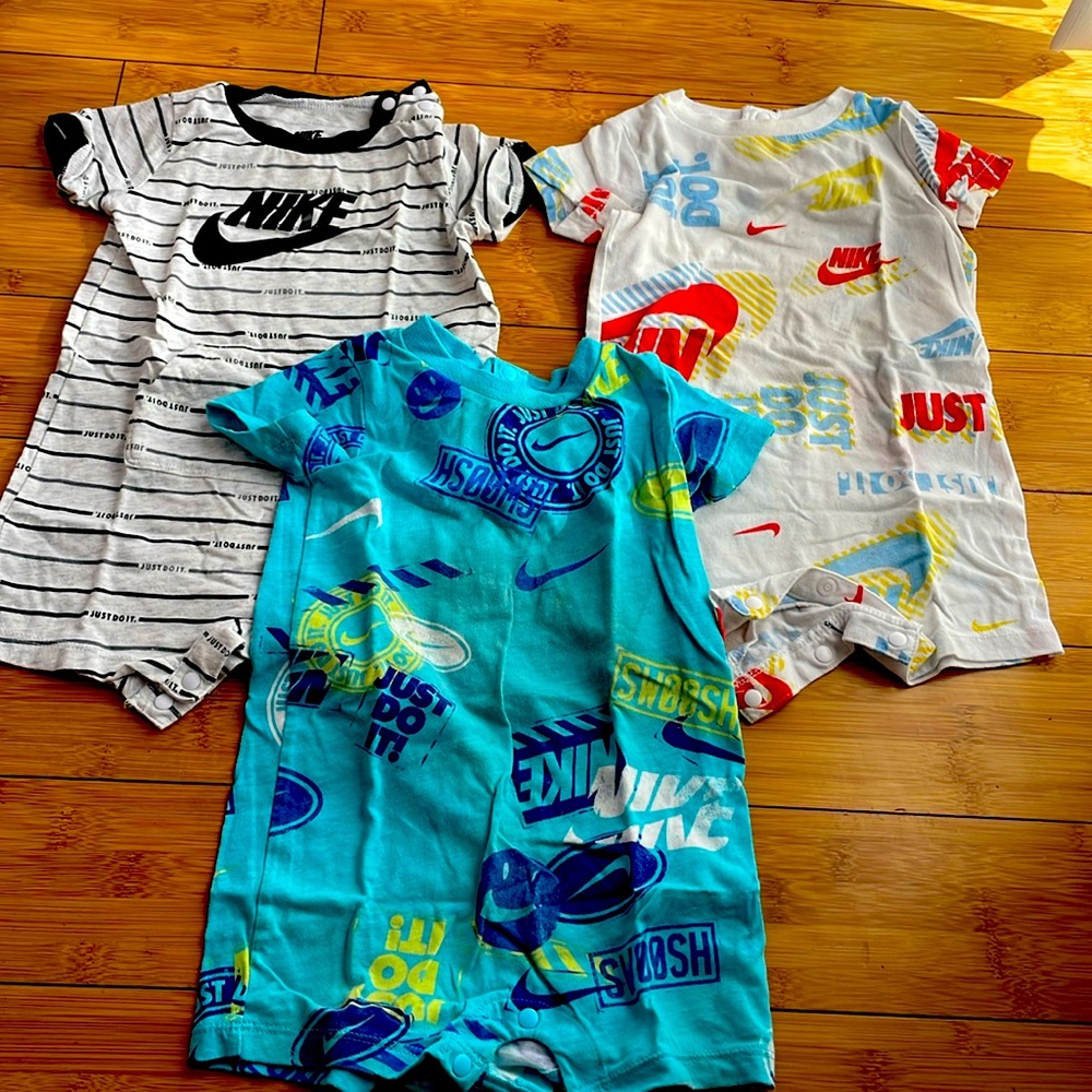 Bundle! Baby boy Nike rompers. All 9 months. Good condition. Barley worn!